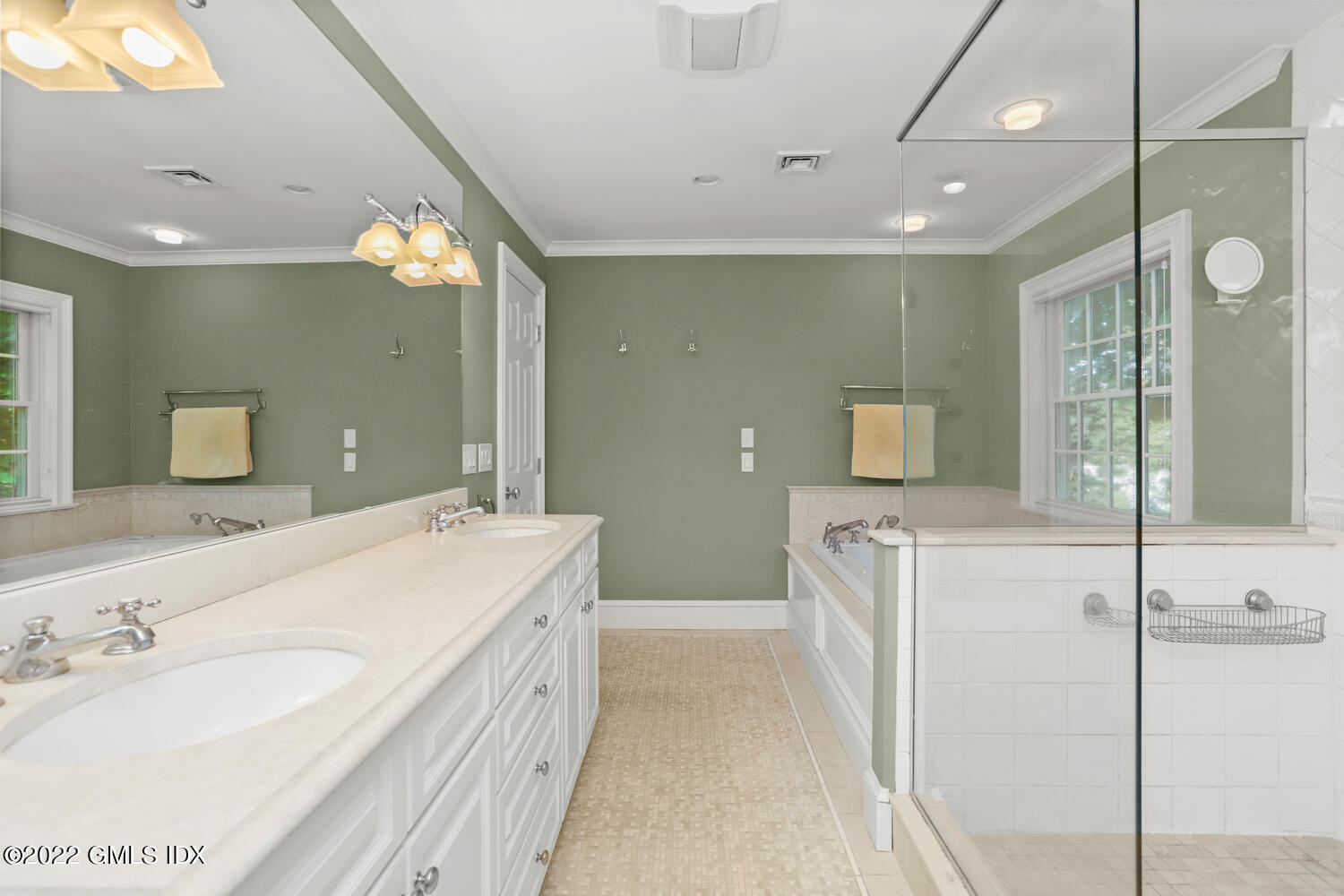 9 Robin Place Old Greenwich, CT 06870 - Photo 24 of 51 a spacious bathroom with a double vanity sink a mirror and shower