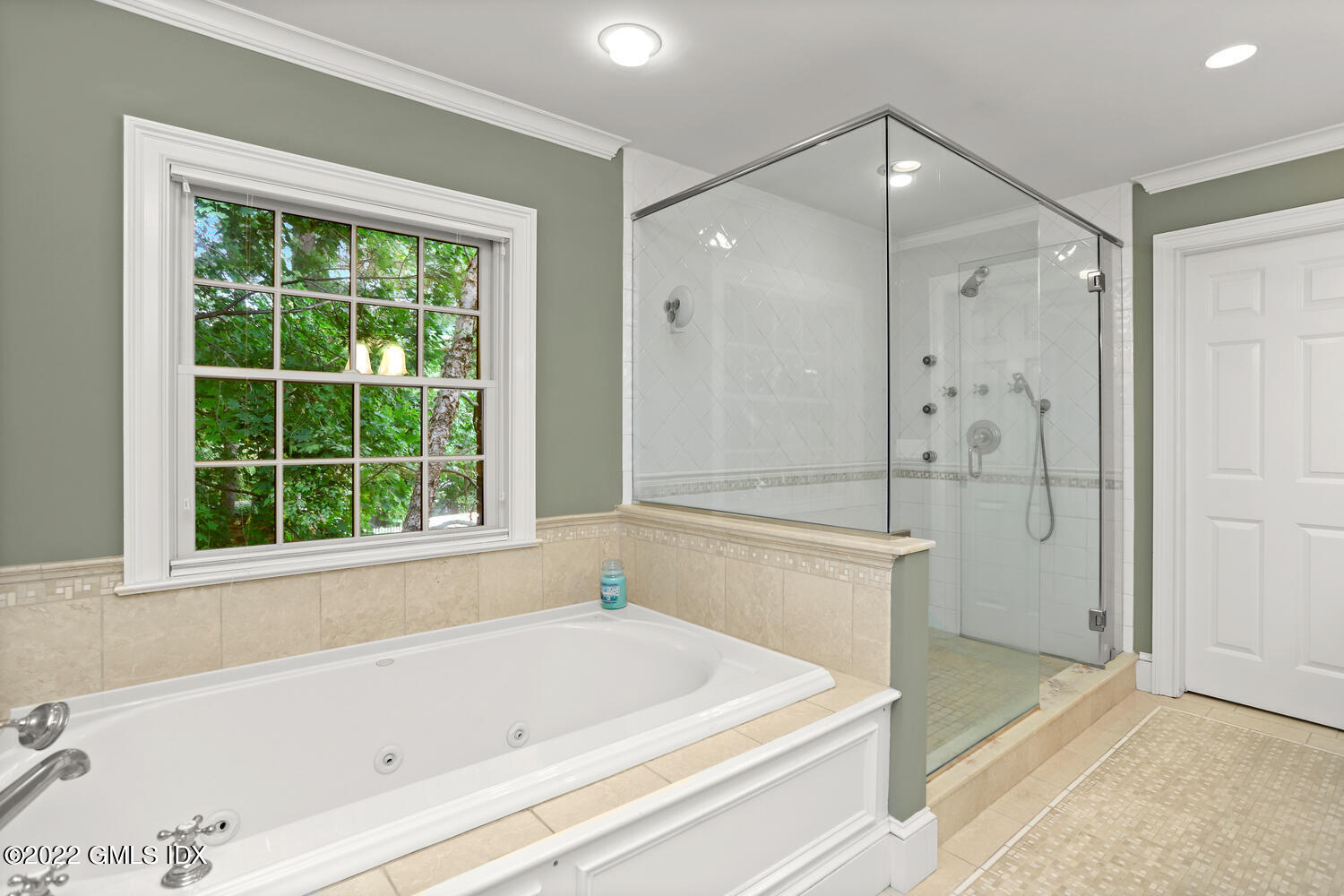9 Robin Place Old Greenwich, CT 06870 - Photo 25 of 51 a bathroom with a bathtub and a shower