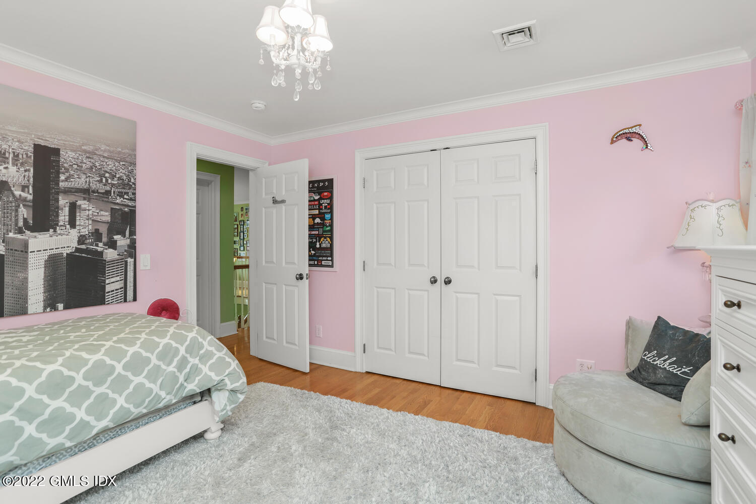 9 Robin Place Old Greenwich, CT 06870 - Photo 27 of 51 a bedroom with a bed and window