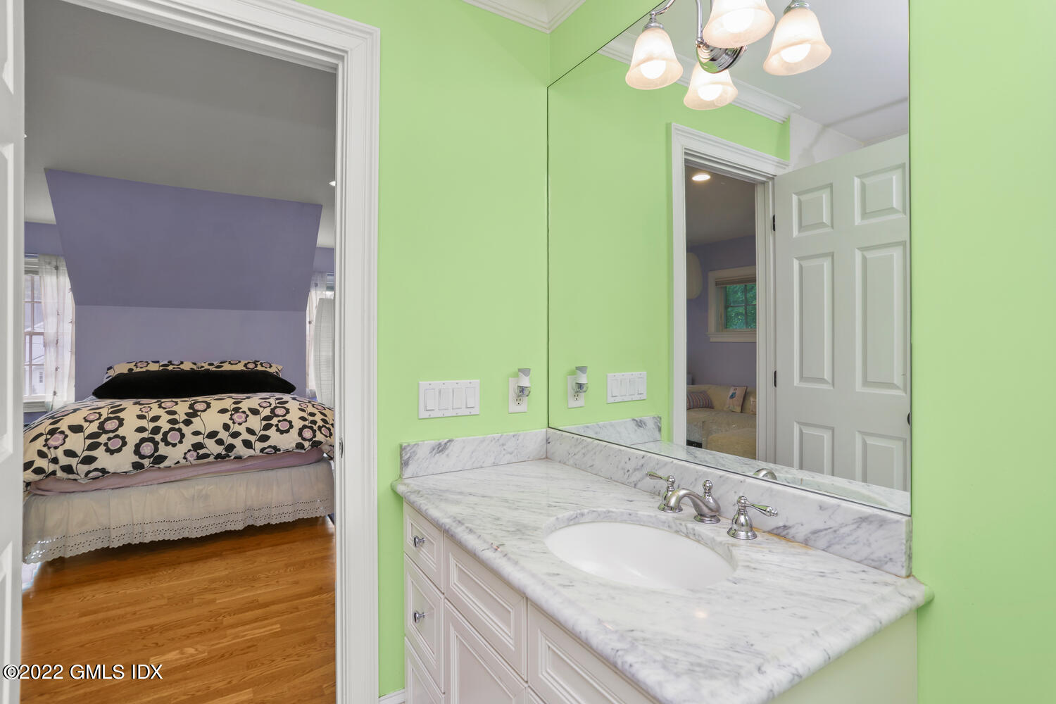 9 Robin Place Old Greenwich, CT 06870 - Photo 33 of 51 a bathroom with a granite countertop sink and a mirror