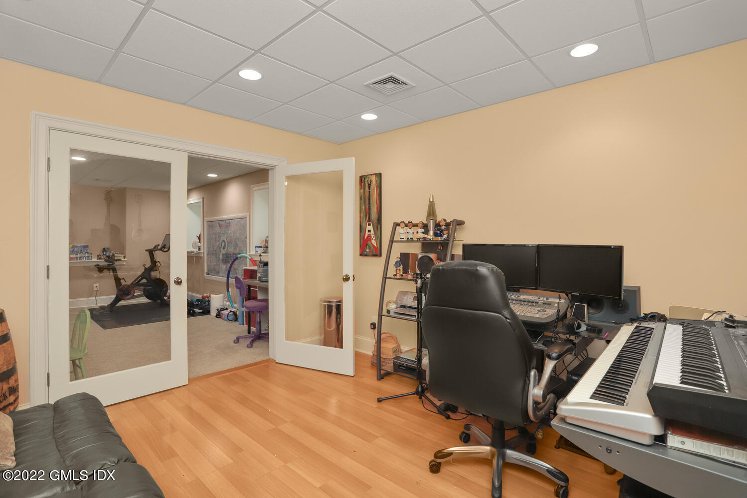 9 Robin Place Old Greenwich, CT 06870 - Photo 39 of 51 a view of a workspace with furniture and a gym