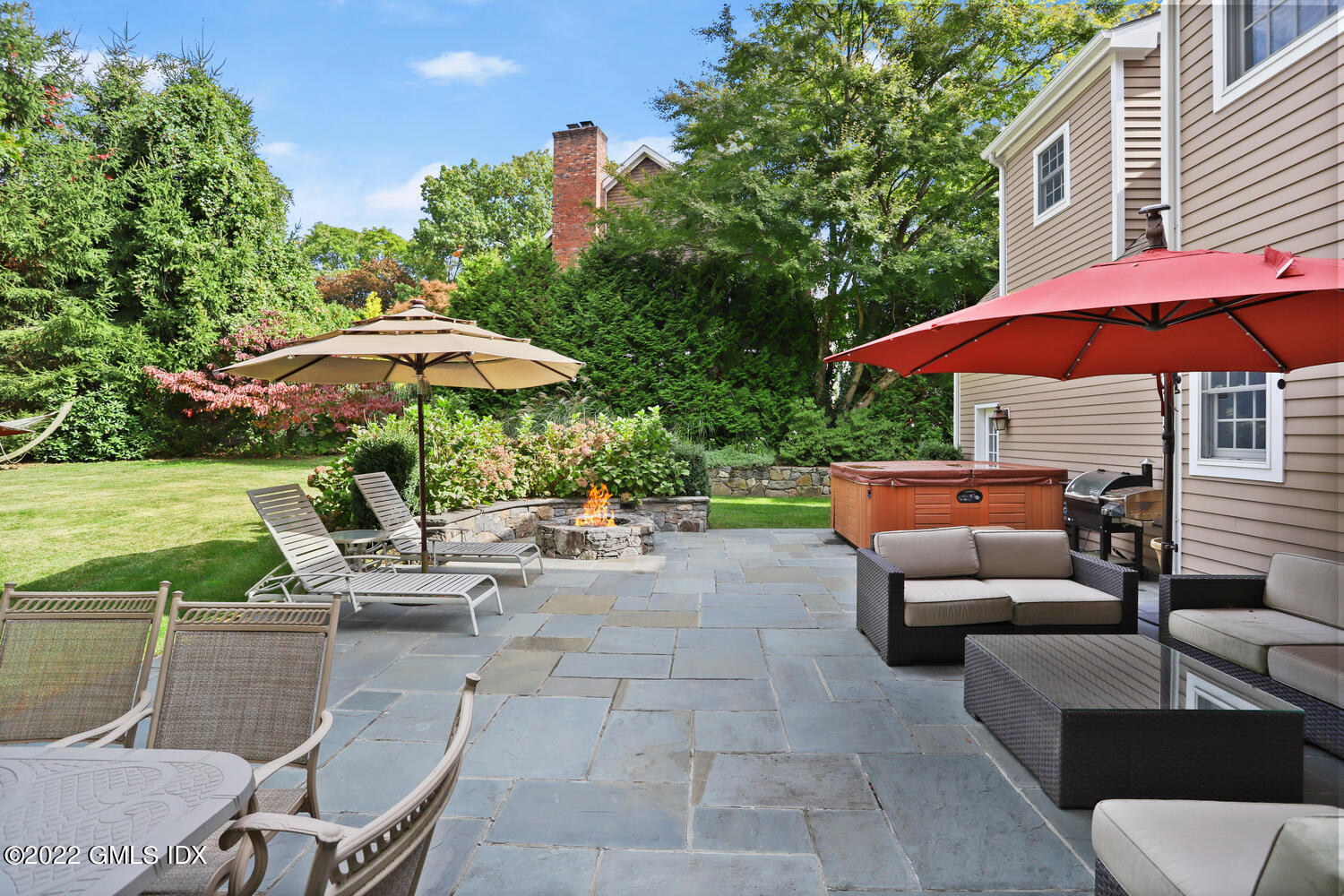 9 Robin Place Old Greenwich, CT 06870 - Photo 41 of 51 a view of backyard with swimming pool and seating space