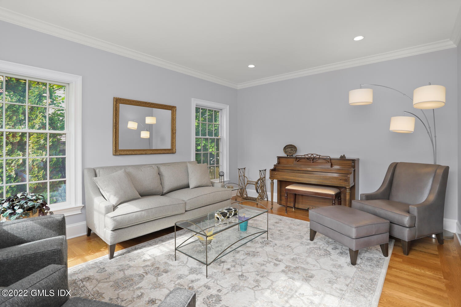 9 Robin Place Old Greenwich, CT 06870 - Photo 5 of 51 a living room with furniture a piano and a window
