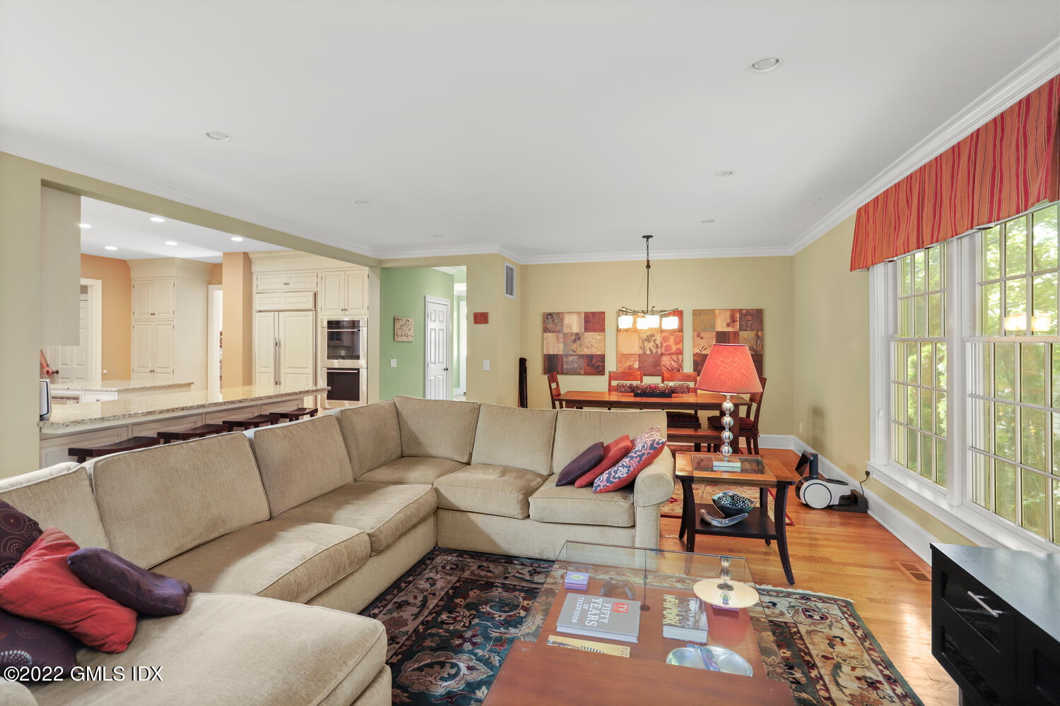 9 Robin Place Old Greenwich, CT 06870 - Photo 9 of 51 a living room with furniture and a large window