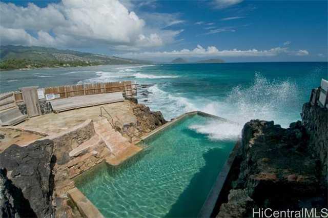 4080 Black Point Road Honolulu, HI 96816 - Photo 1 of 1 a view of a lake with a yard