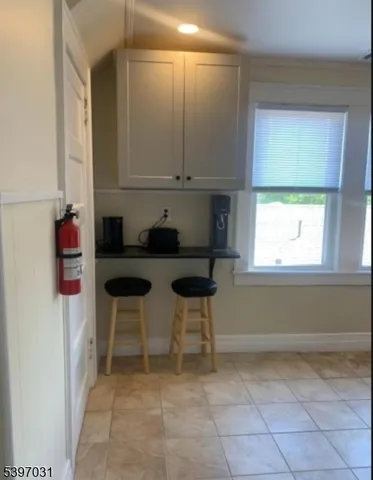 a kitchen with a sink and a cabinets