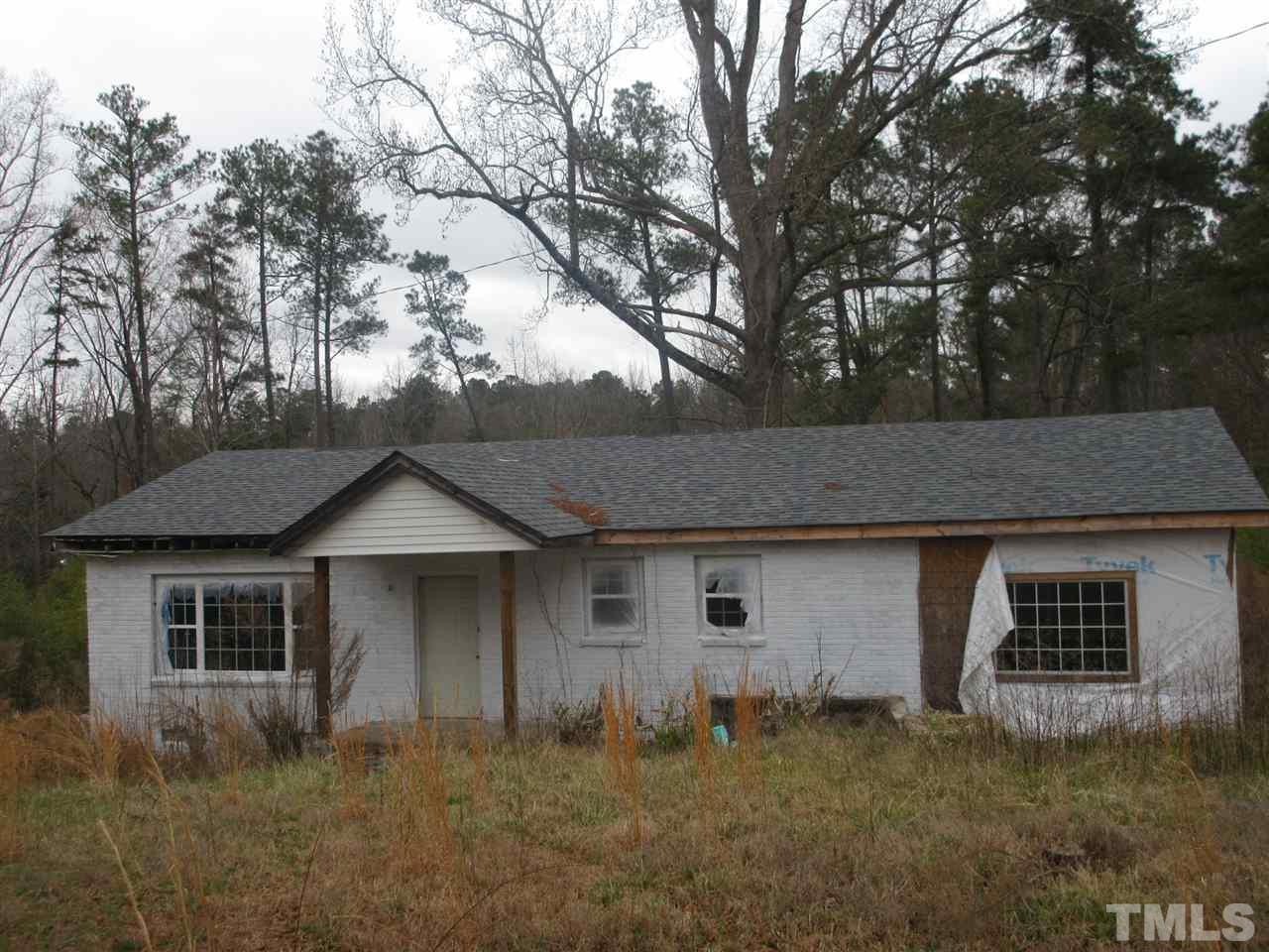 front view of a house with a dry yard