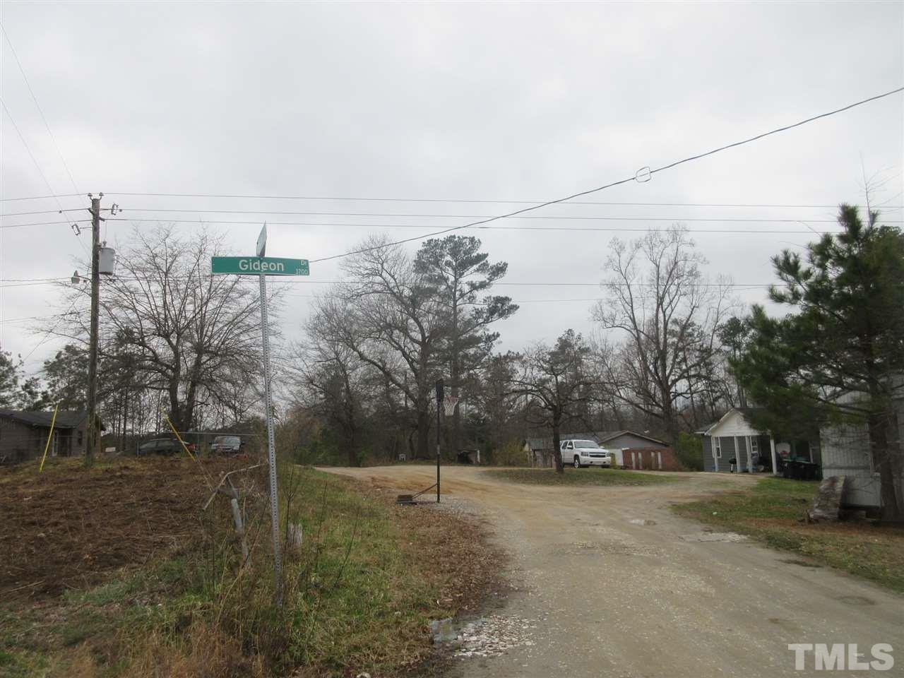 4921 Universal Drive Wake Forest, NC 27587 - Photo 14 of 15 a view of a yard with a tree