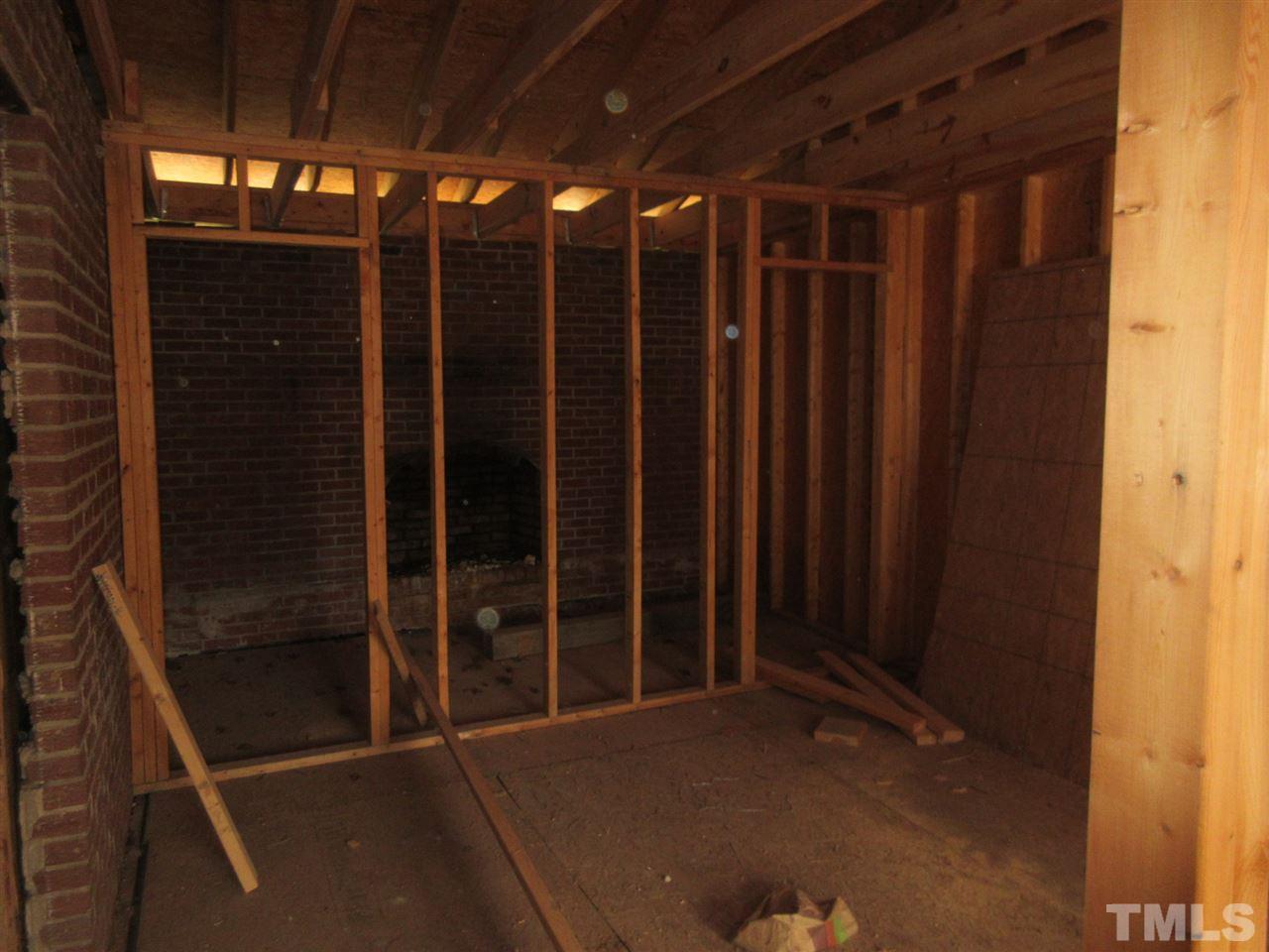 4921 Universal Drive Wake Forest, NC 27587 - Photo 5 of 15 a view of an empty room with a window