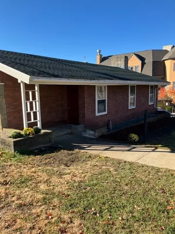 a front view of a house with garage