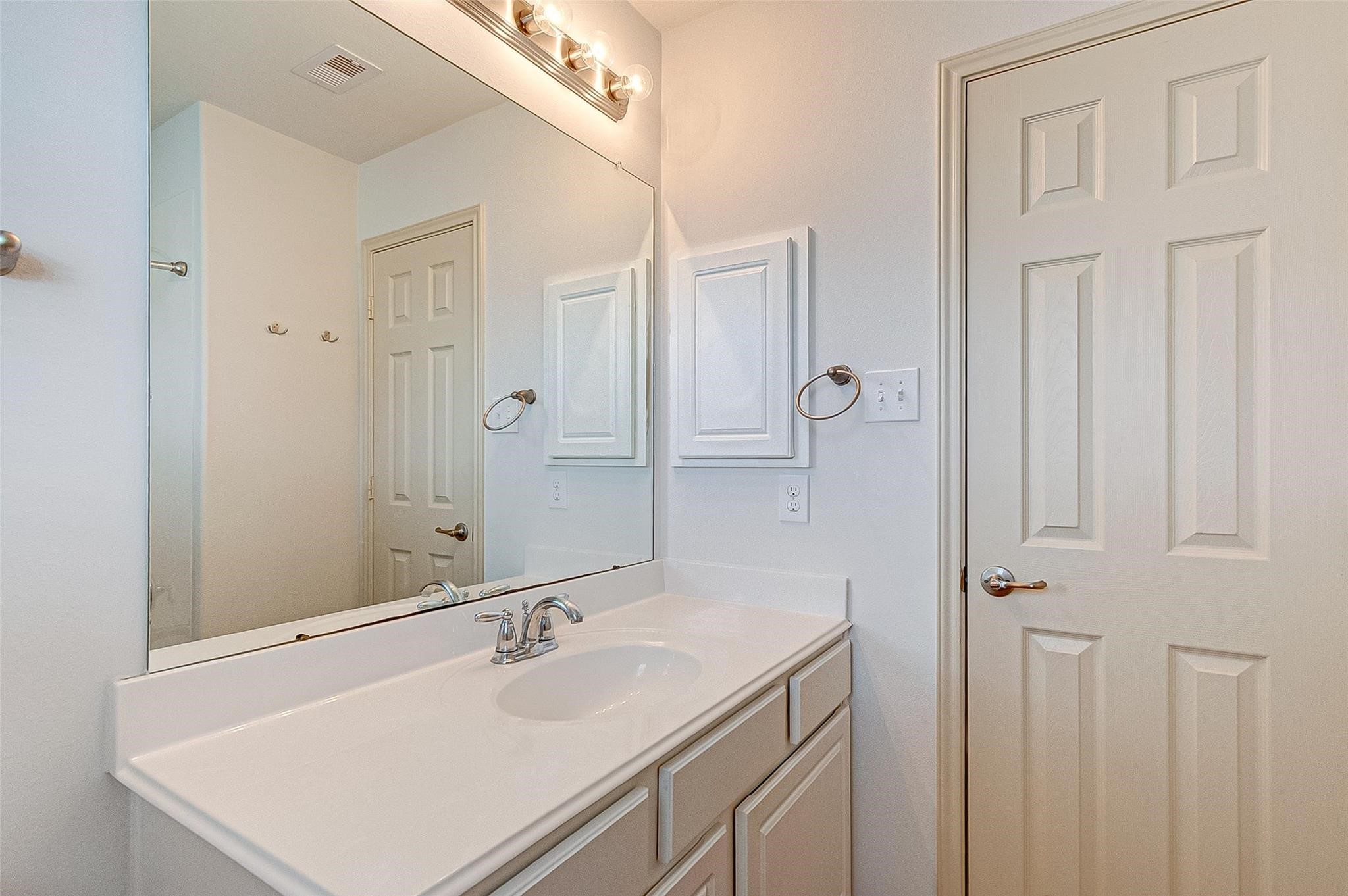 79 West Lasting Spring Circle Spring, TX 77389 - Photo 41 of 48 a bathroom with a sink and a mirror