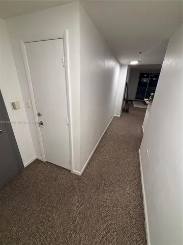 a view of hallway with stairs