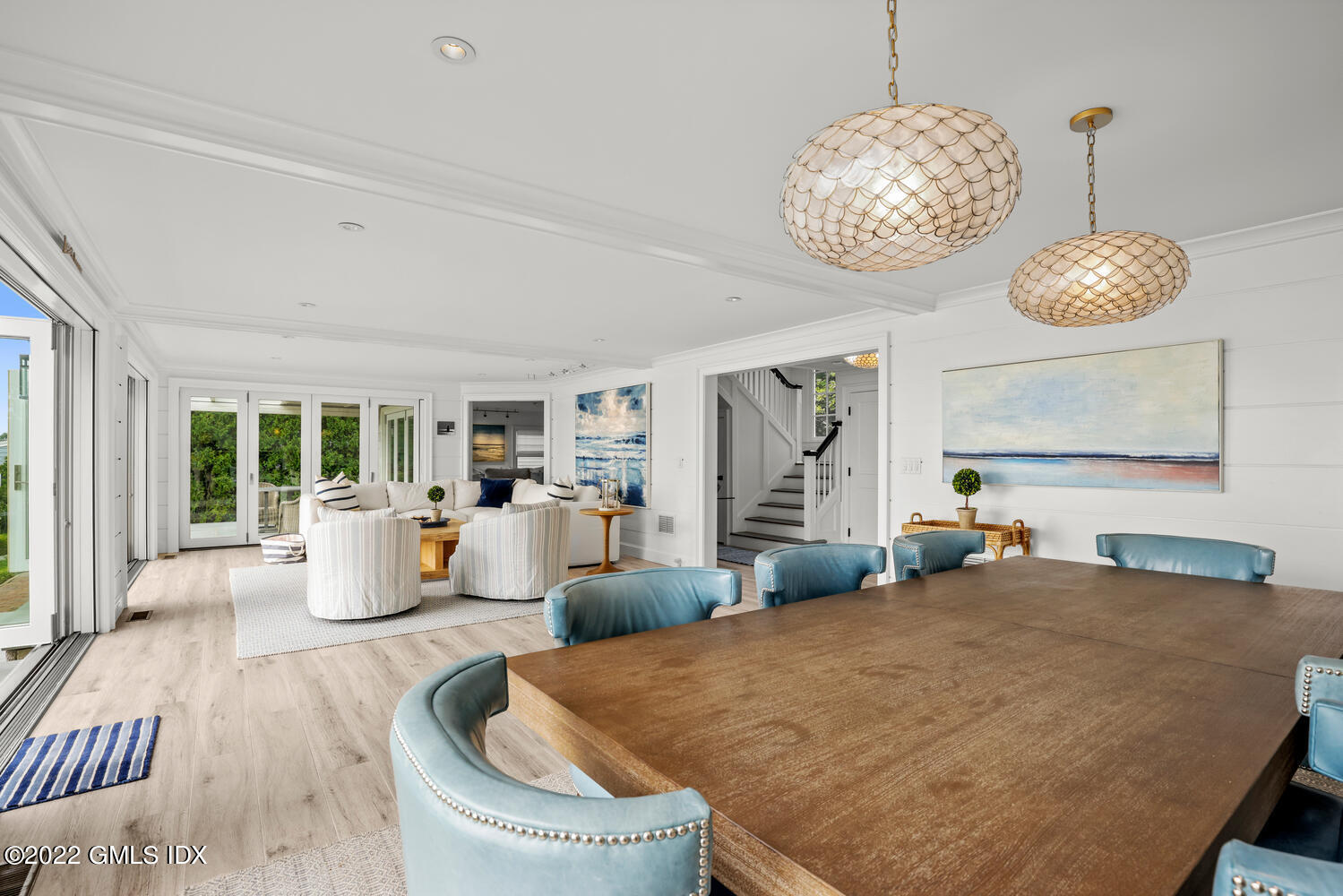 53 Shore Road Clinton, CT 06413 - Photo 2 of 32 a living room with furniture chandelier and large window