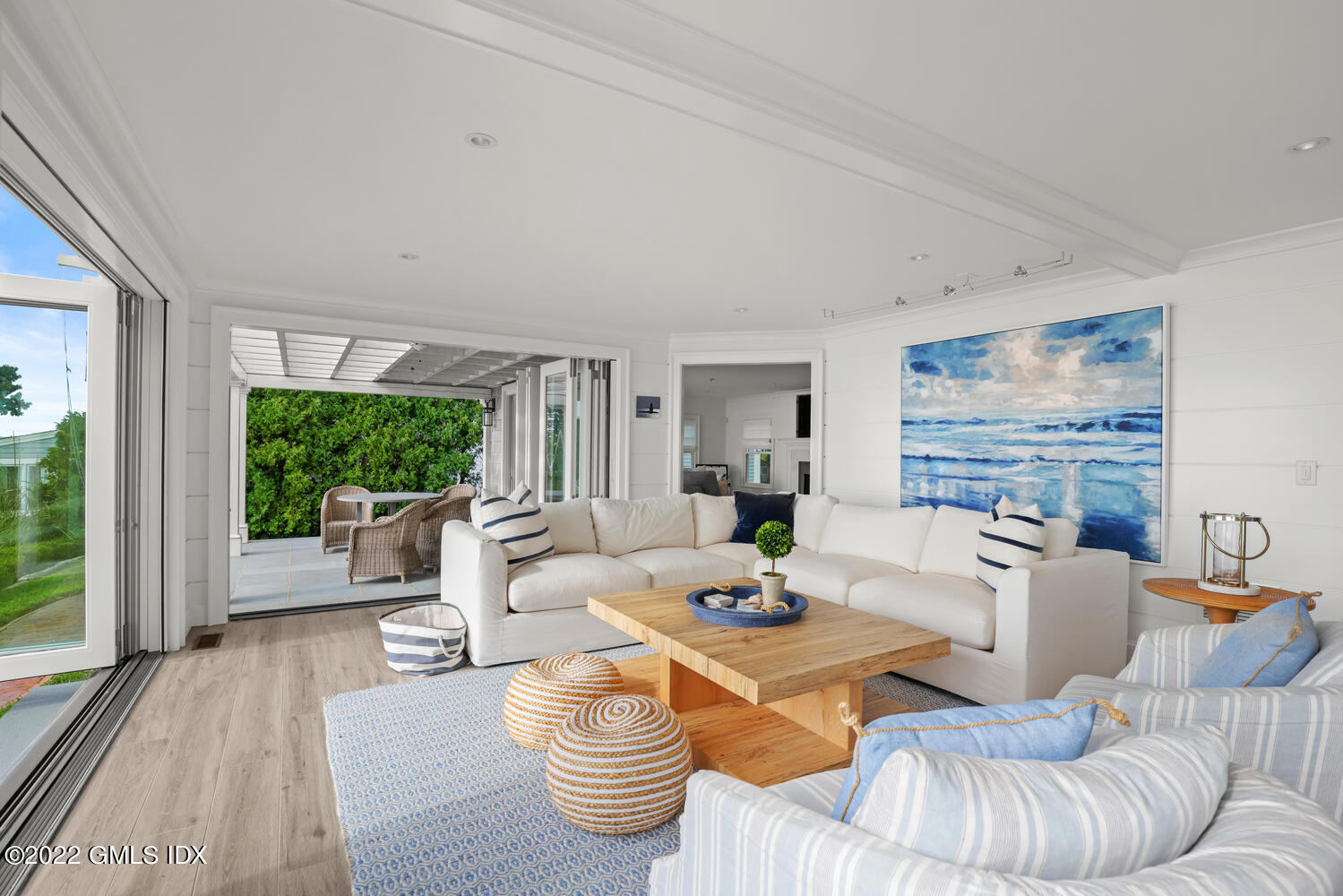 53 Shore Road Clinton, CT 06413 - Photo 7 of 32 a living room with furniture and a large window