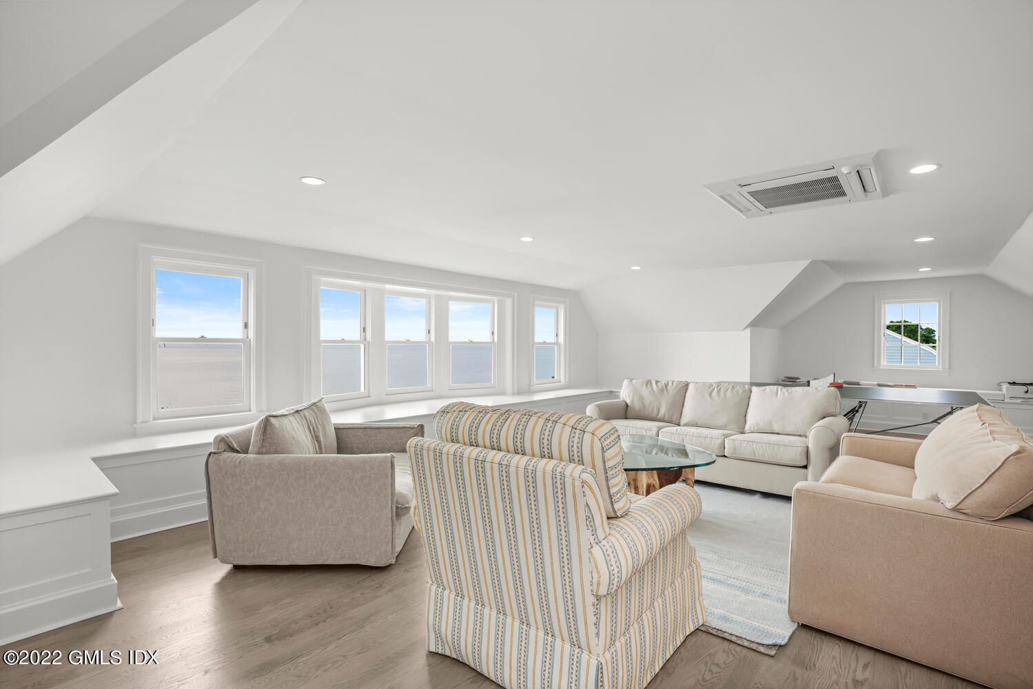 53 Shore Road Clinton, CT 06413 - Photo 10 of 32 a living room with furniture and a large window