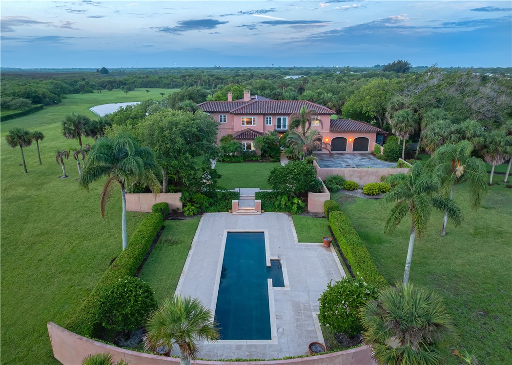 2350 Quay Dock Road Vero Beach, FL 32967 - Photo 2 of 35 aerial view of a house with a yard