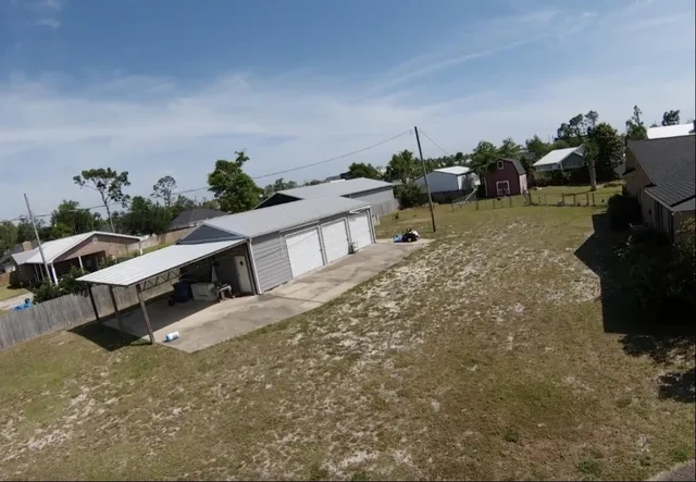 a view of a fountain with tree s