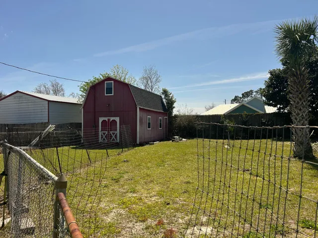 a swimming pool view with a lake view