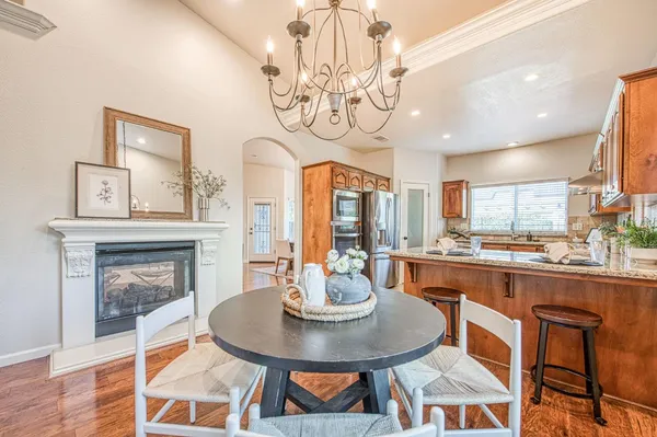 a kitchen with stainless steel appliances a refrigerator and cabinets