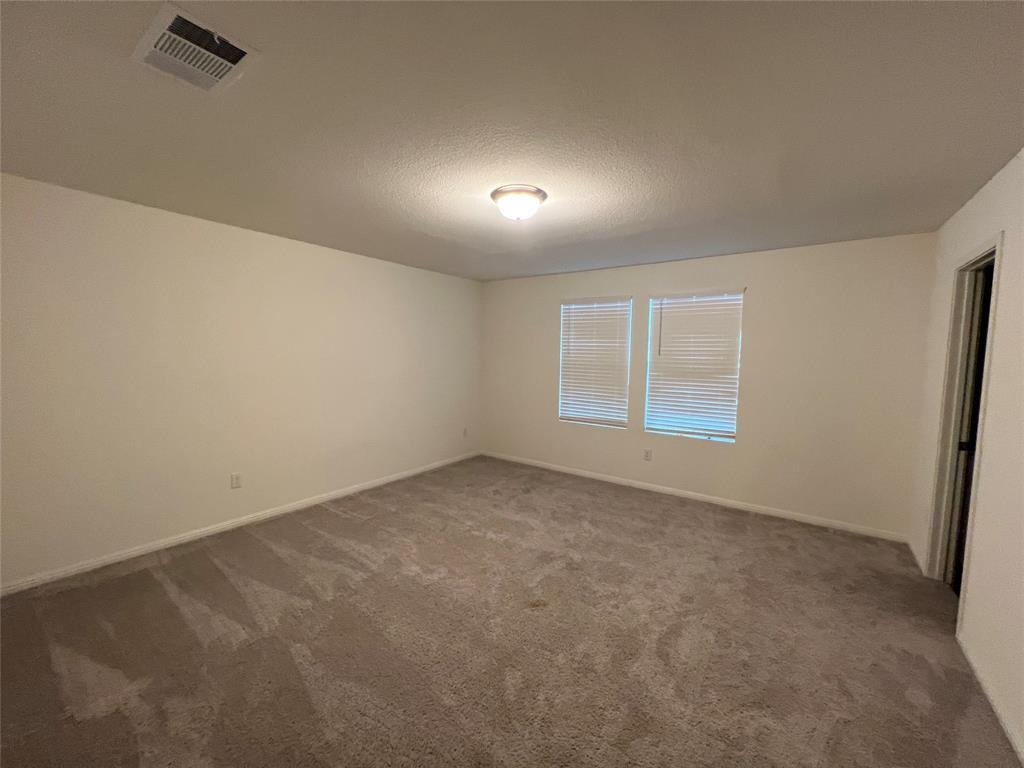 309 Redfish Lane Hutto, TX 78634 - Photo 5 of 15 an empty room with a empty space