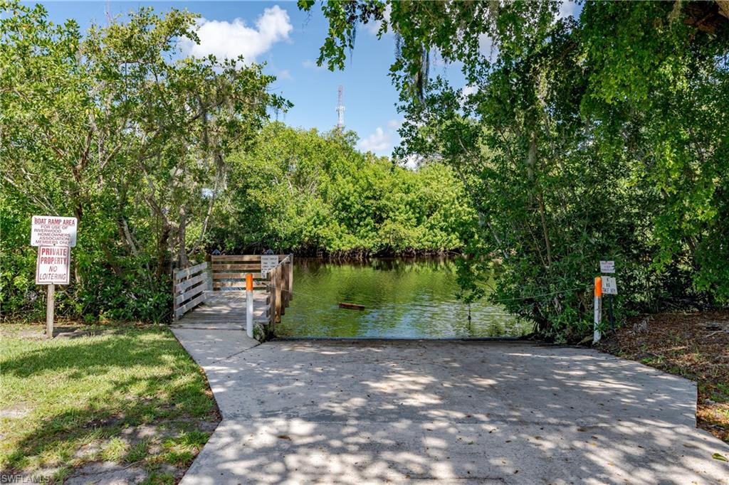 255 Riverwood Road Naples, FL 34114 - Photo 35 of 35 a view of a yard