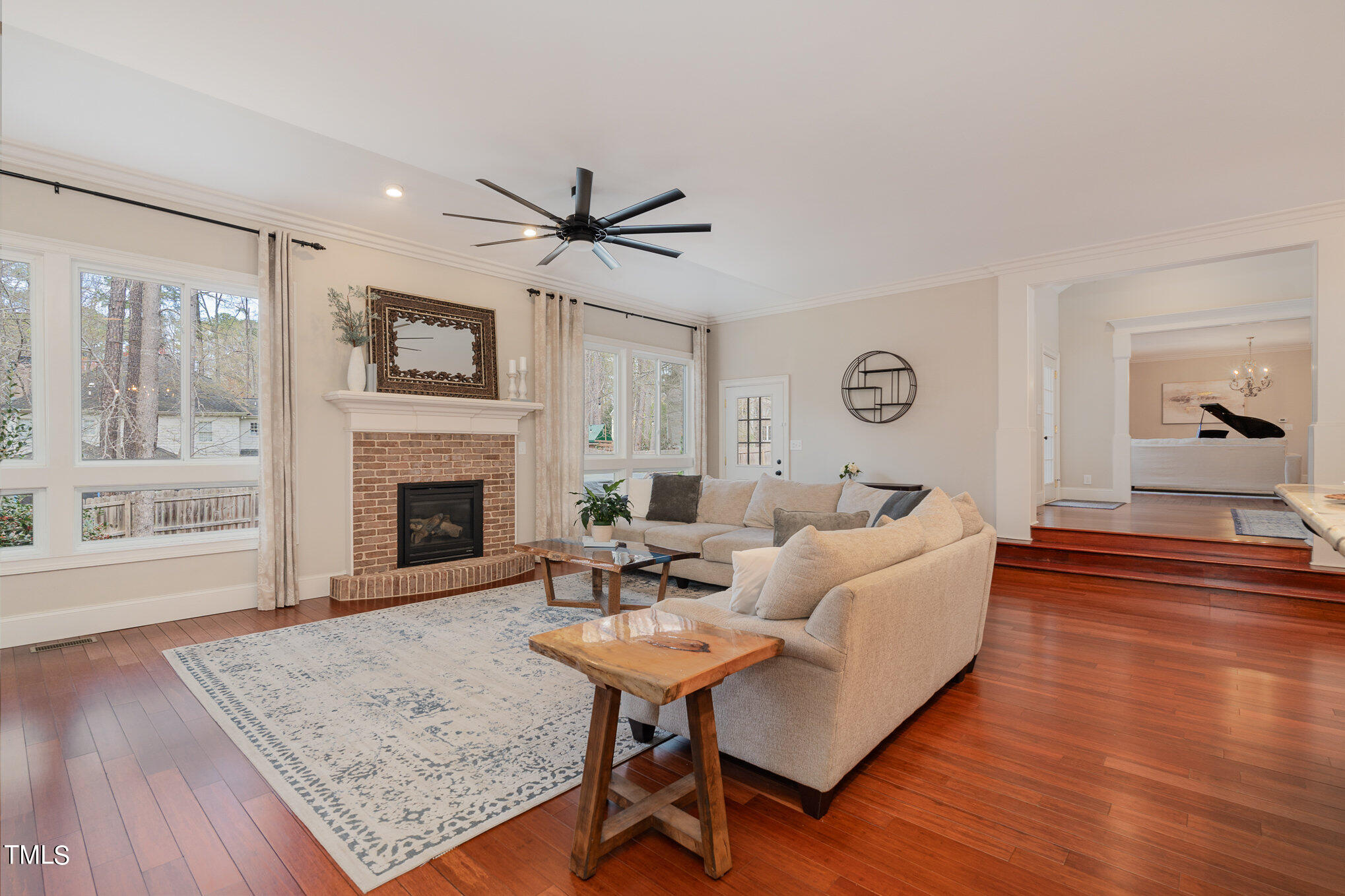 8404 Smith Road Apex, NC 27539 - Photo 7 of 19 Beautiful brick fireplace to enjoy
