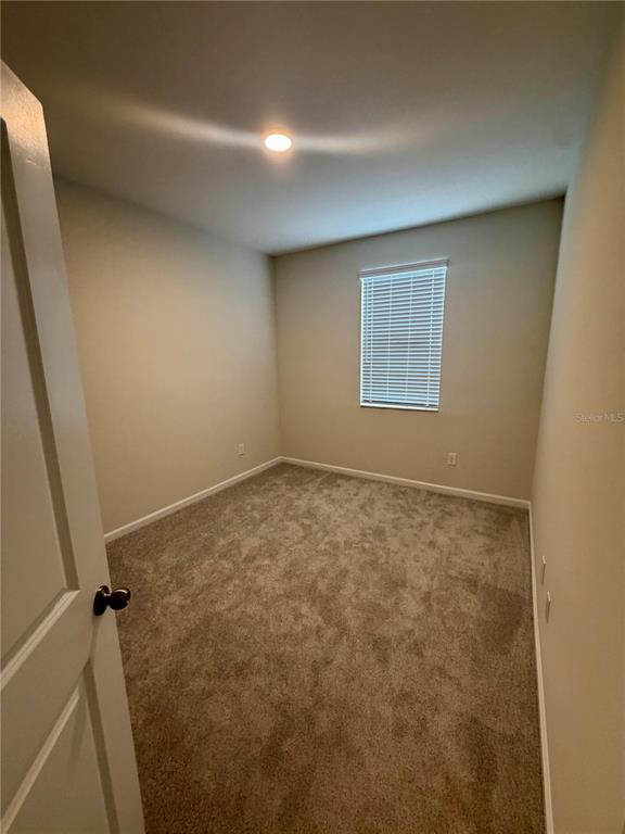 5222 Ctr Lk Rnch Boulevard St. Cloud, FL 34771 - Photo 15 of 25 a view of room and window