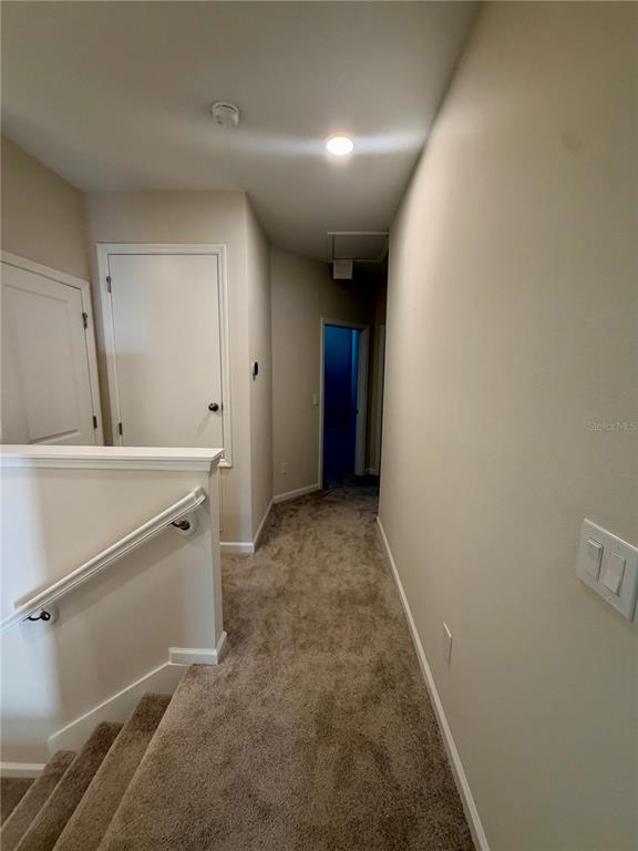 5222 Ctr Lk Rnch Boulevard St. Cloud, FL 34771 - Photo 18 of 25 a view of a hallway with closet