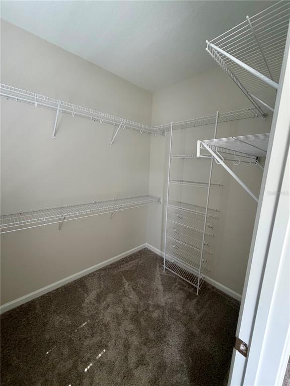 5222 Ctr Lk Rnch Boulevard St. Cloud, FL 34771 - Photo 22 of 25 a view of a room with empty racks