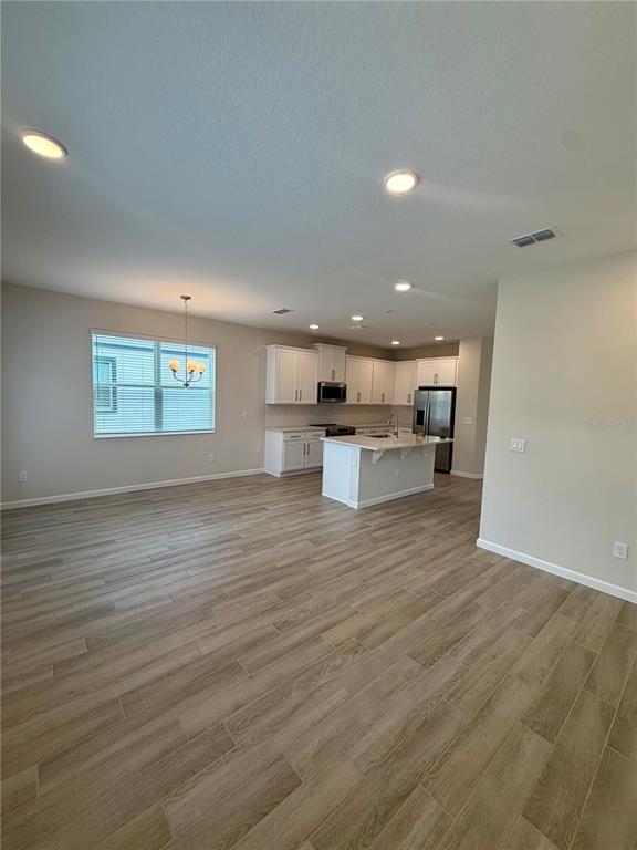 5222 Ctr Lk Rnch Boulevard St. Cloud, FL 34771 - Photo 8 of 25 a view of a kitchen with a sink and a window