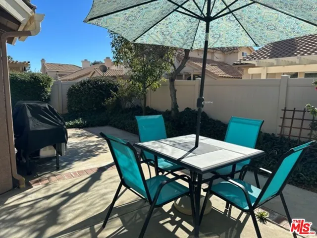 a view of an outdoor space with furniture