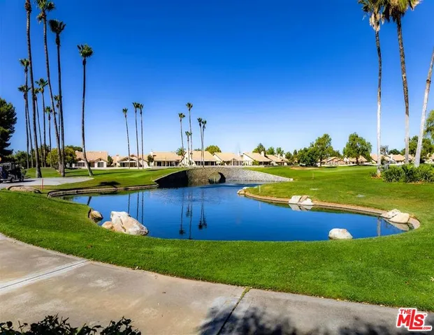 a area with pool table and chairs