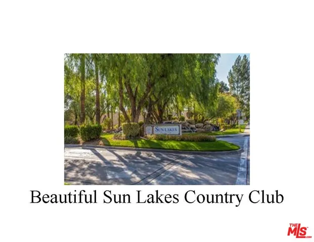 a picture of a bench in middle of a building
