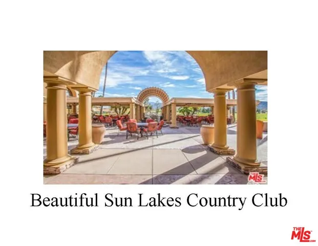 a view of a house with backyard swimming pool and outdoor seating