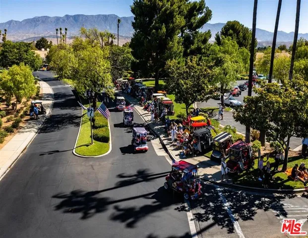 a view of swimming pool with outdoor seating