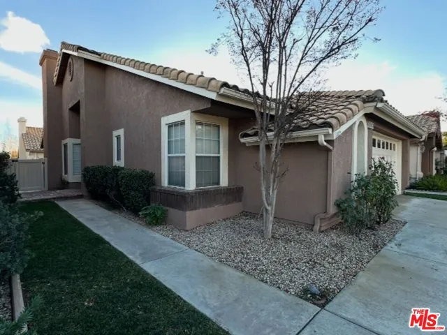 a house view with a outdoor space