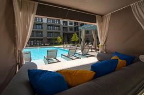 2033 South Gessner Road, Unit 3220 Houston, TX 77063 - Photo 12 of 20 a view of balcony with couch and outdoor view