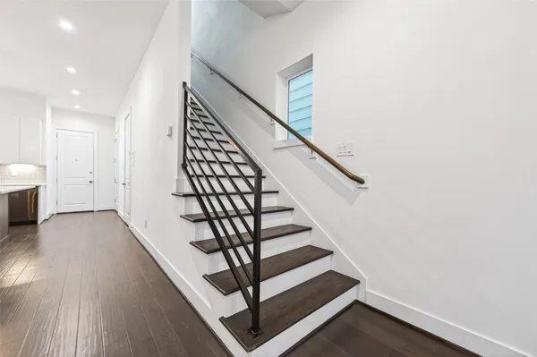 a view of entryway with wooden floor