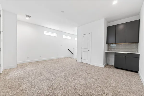 an empty room with an entryway