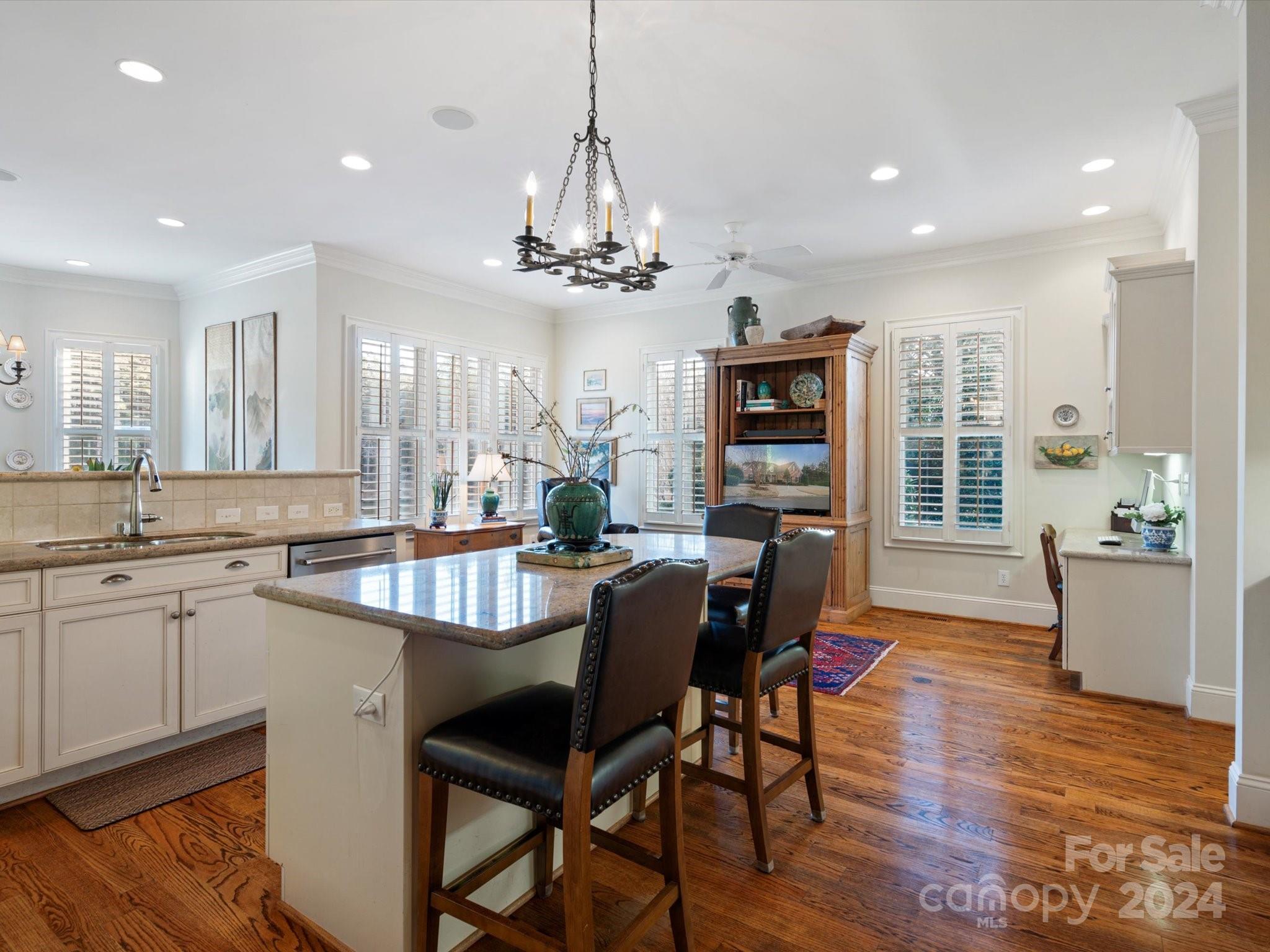 135 Spring Branch Road Fort Mill, SC 29715 - Photo 12 of 48 a view of a dining room with furniture window and wooden floor