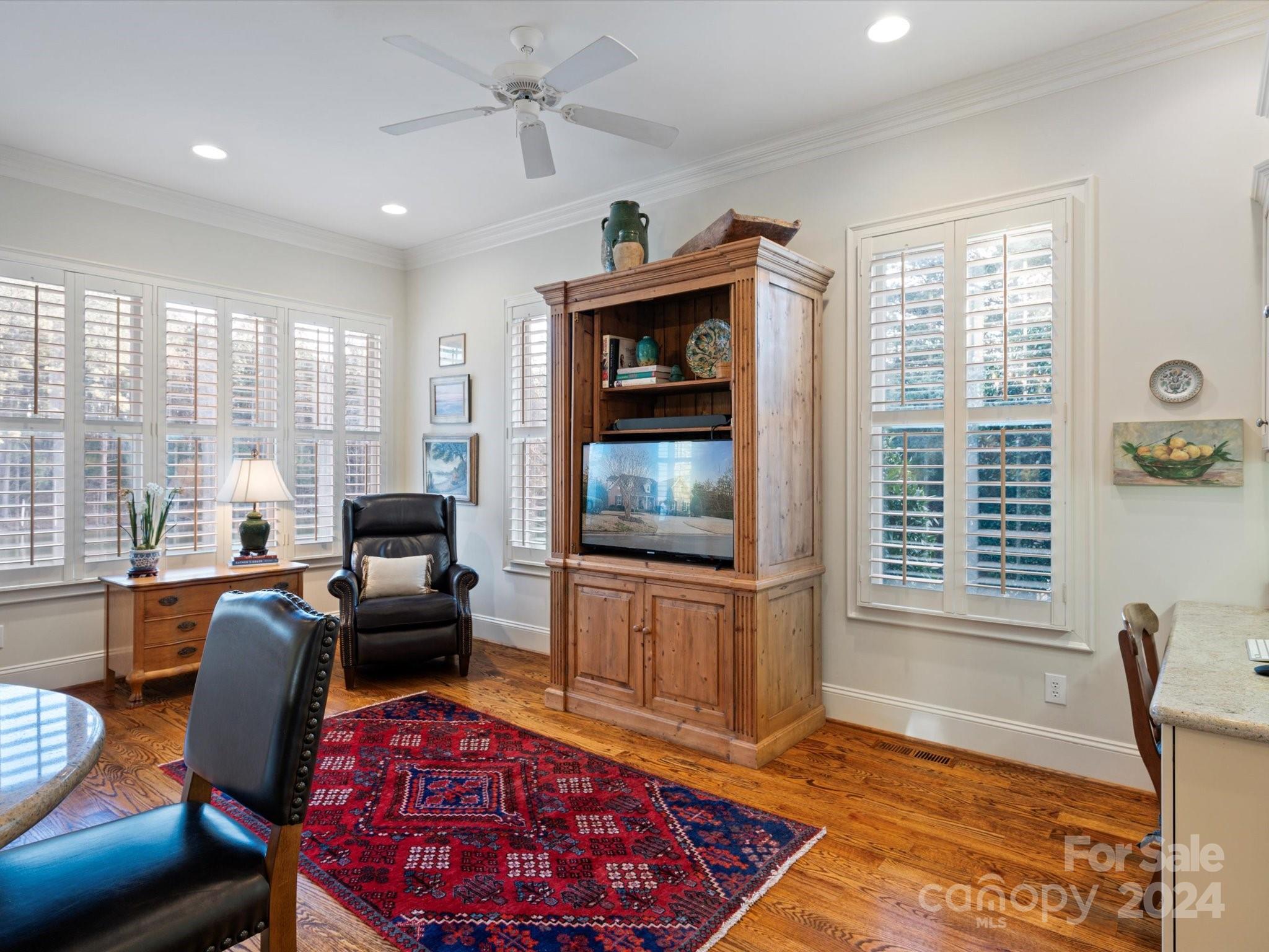 135 Spring Branch Road Fort Mill, SC 29715 - Photo 17 of 48 a living room with furniture and a flat screen tv