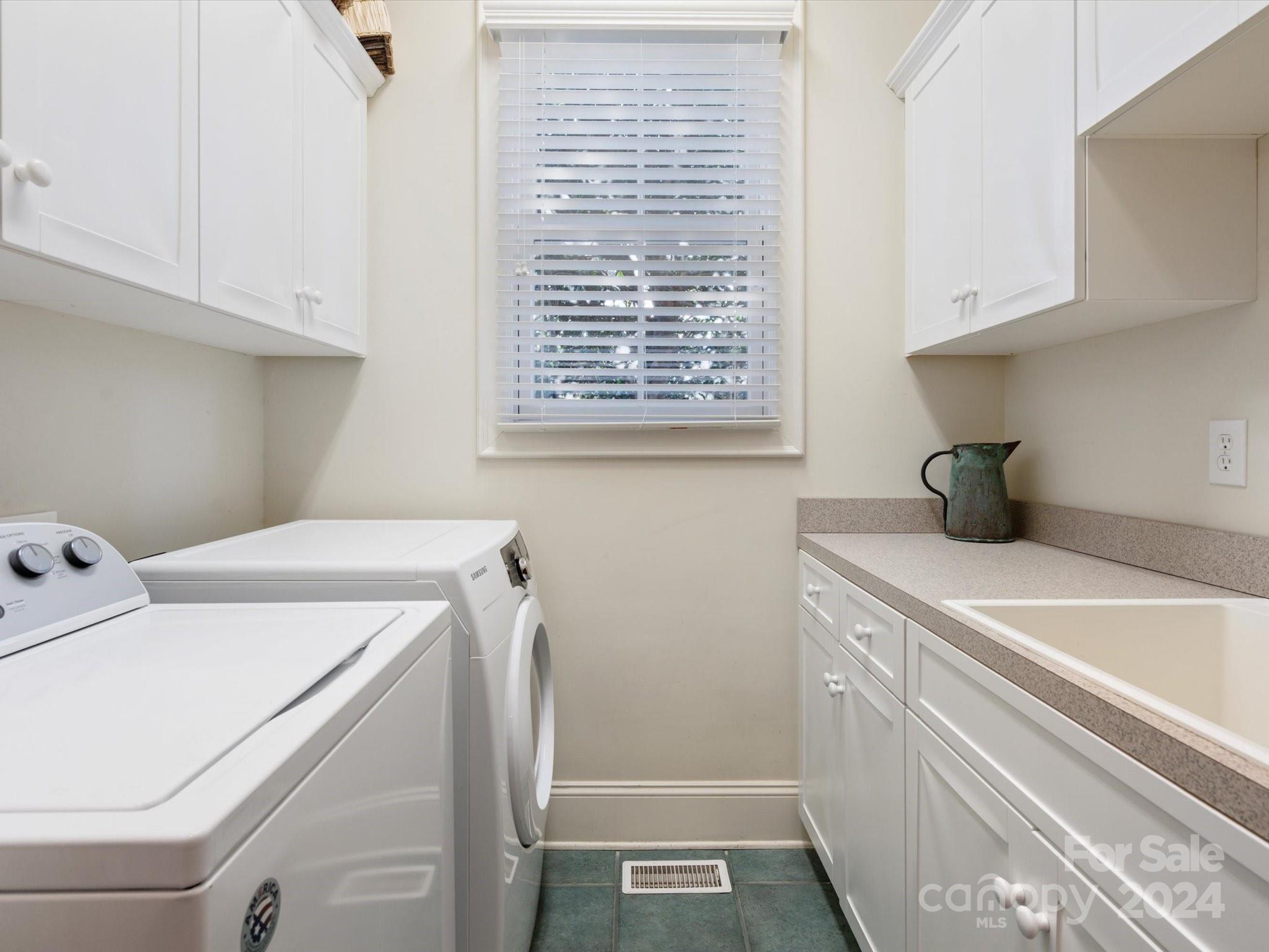 135 Spring Branch Road Fort Mill, SC 29715 - Photo 19 of 48 a utility room with dryer and washer