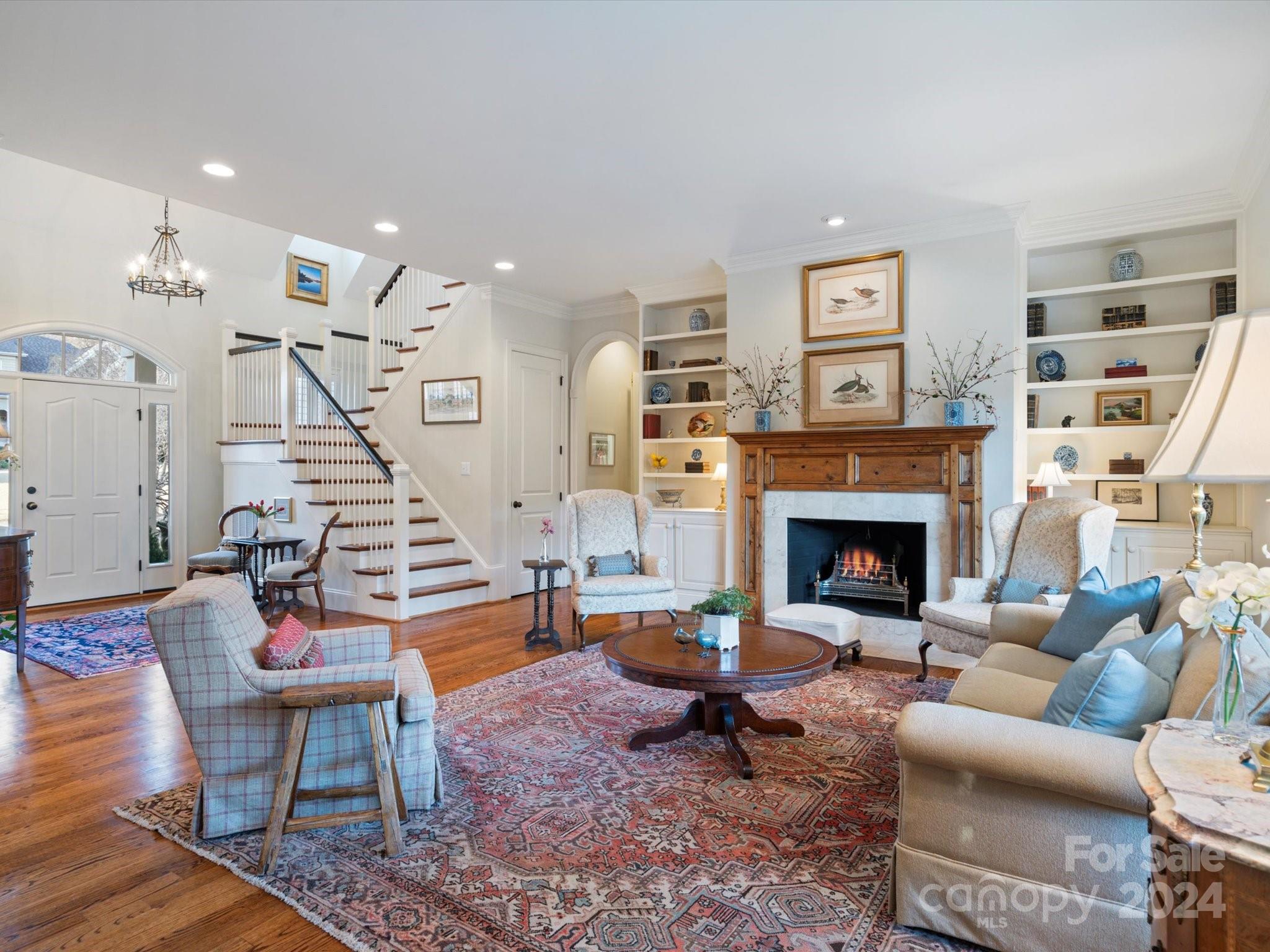 135 Spring Branch Road Fort Mill, SC 29715 - Photo 23 of 48 a living room with furniture and a fireplace