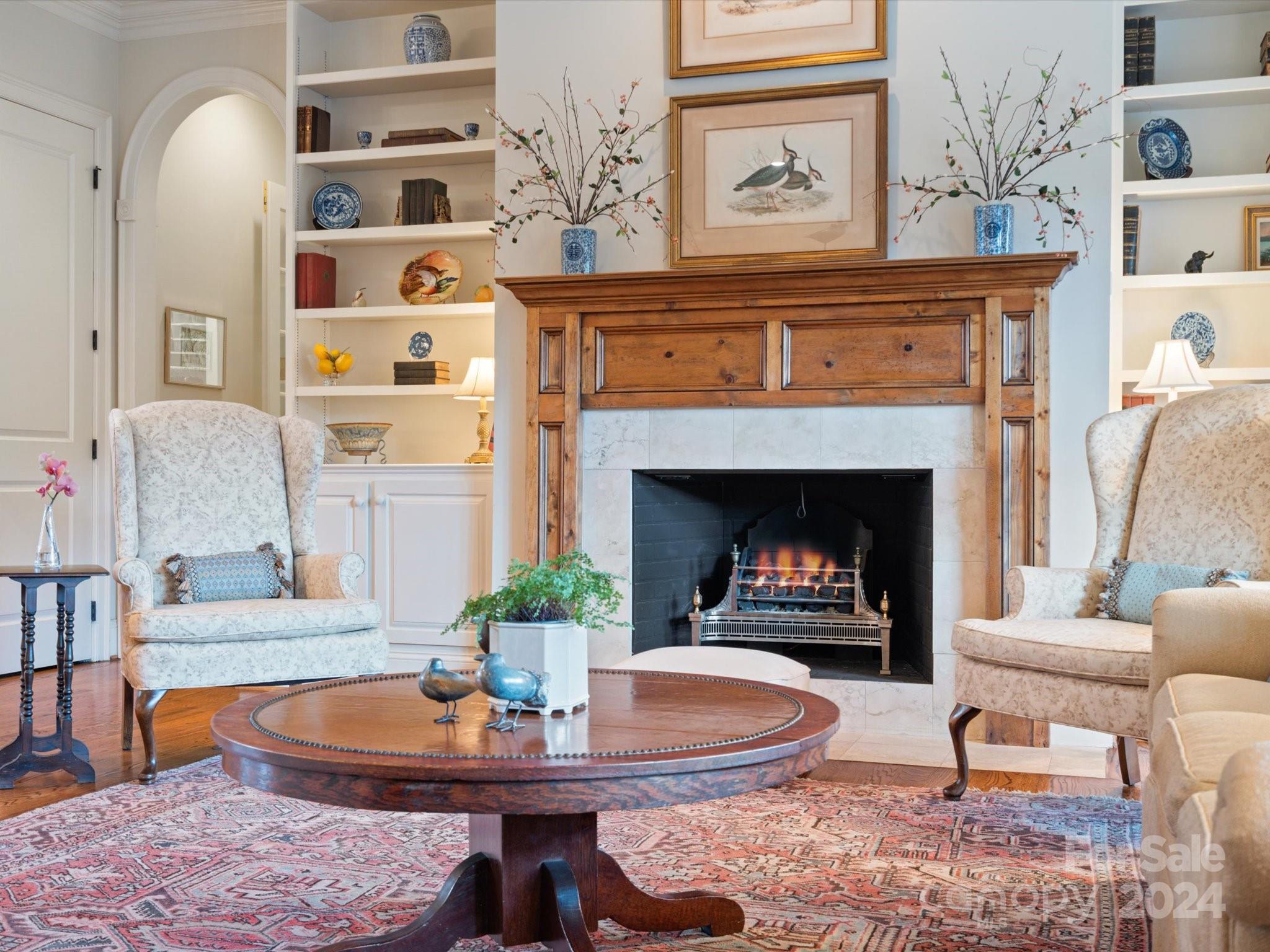 135 Spring Branch Road Fort Mill, SC 29715 - Photo 24 of 48 a living room with furniture and a fireplace