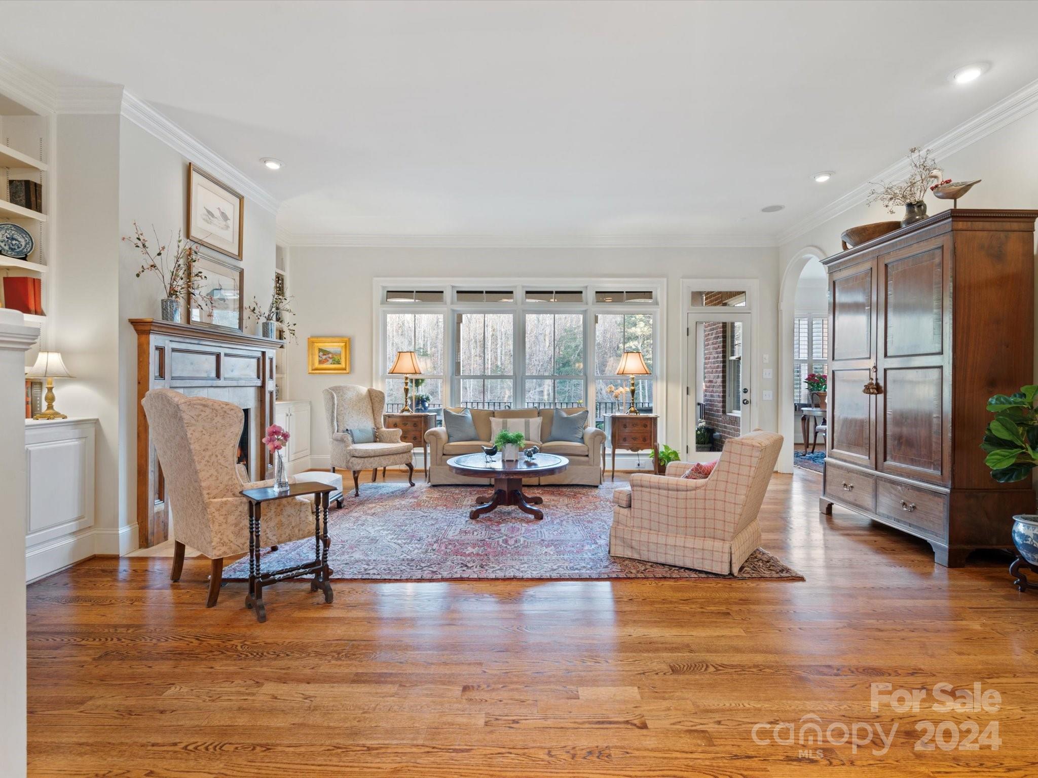 135 Spring Branch Road Fort Mill, SC 29715 - Photo 26 of 48 a living room with furniture and a large window