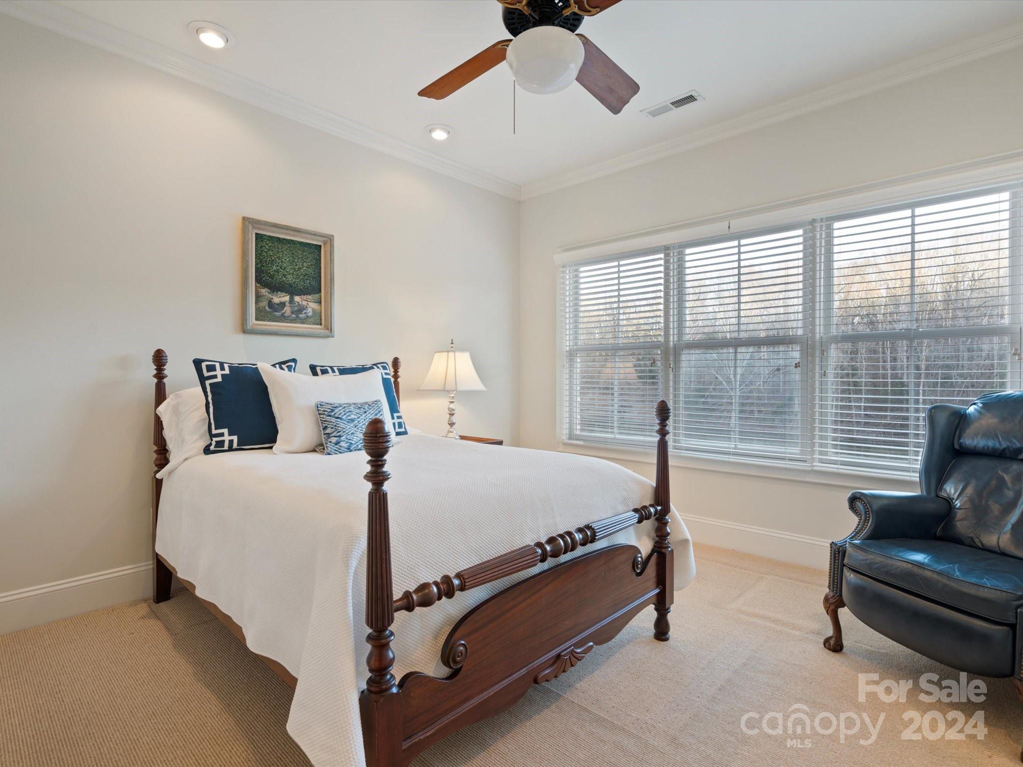 135 Spring Branch Road Fort Mill, SC 29715 - Photo 34 of 48 a bed room with a bed and a couch