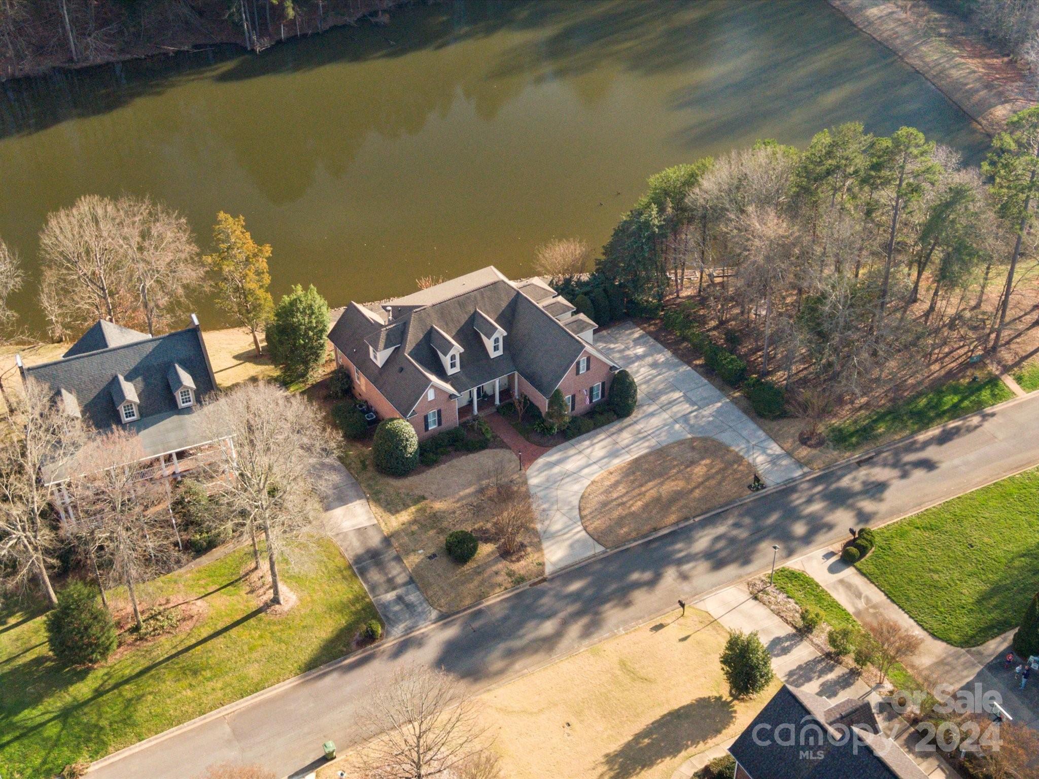 135 Spring Branch Road Fort Mill, SC 29715 - Photo 4 of 48 a view of a lake with a mountain