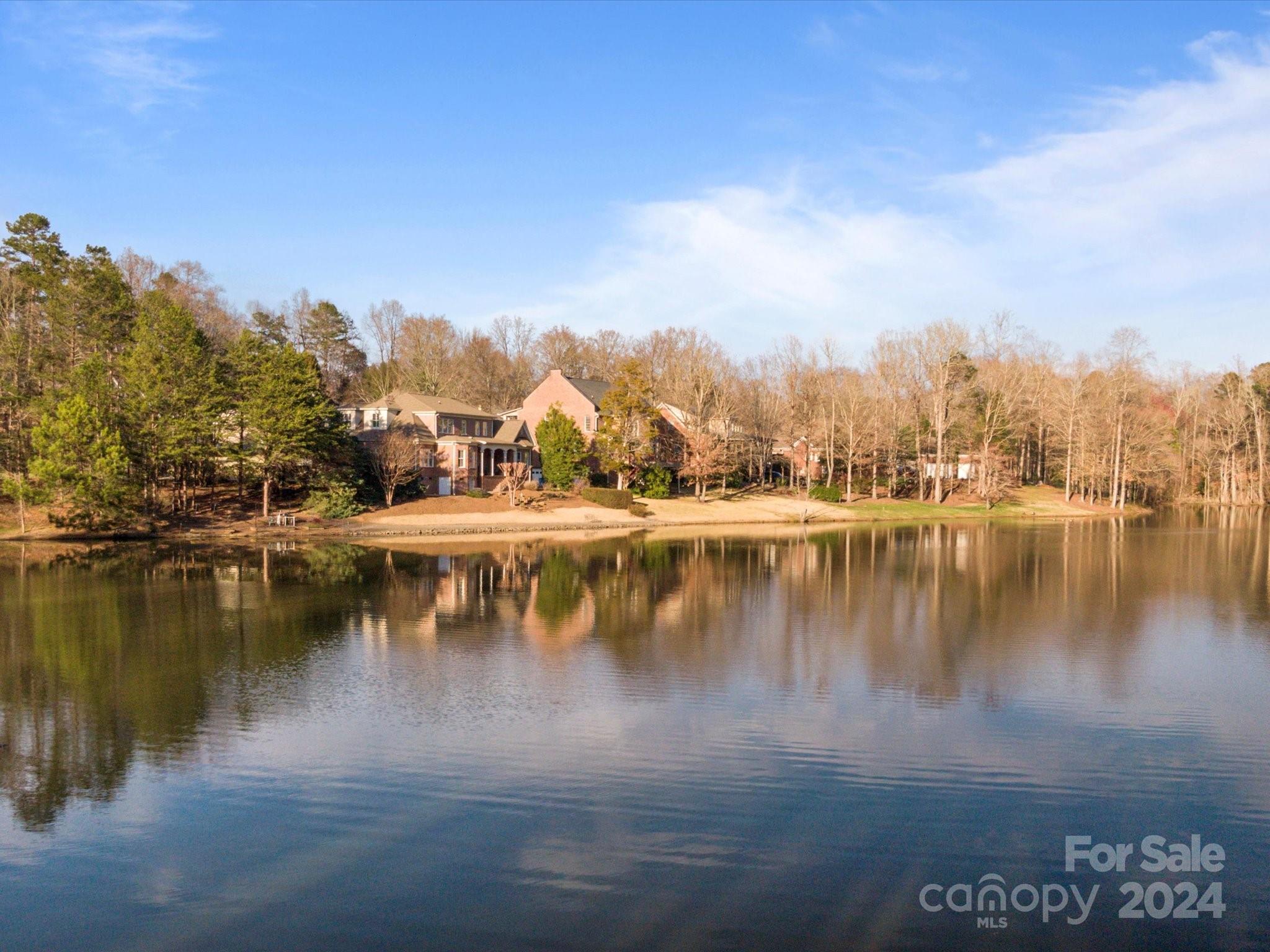 135 Spring Branch Road Fort Mill, SC 29715 - Photo 47 of 48 a view of a lake with houses