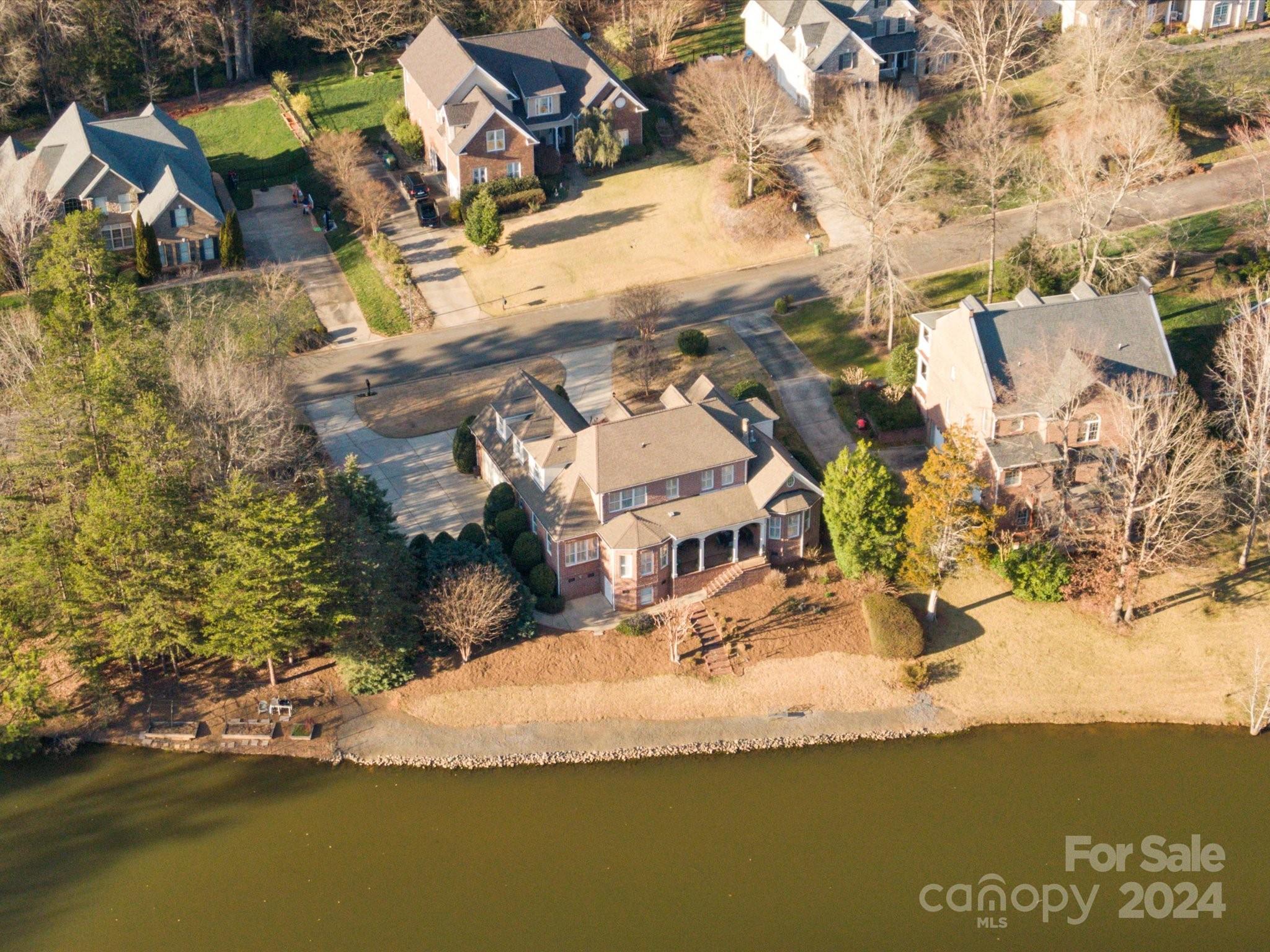 135 Spring Branch Road Fort Mill, SC 29715 - Photo 6 of 48 an aerial view of residential houses with outdoor space