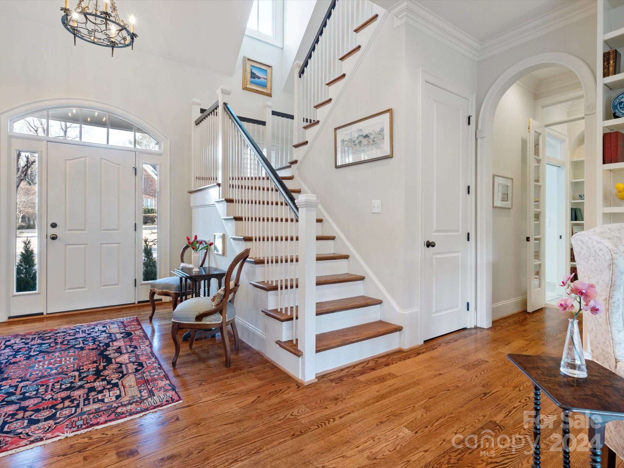 135 Spring Branch Road Fort Mill, SC 29715 - Photo 8 of 48 a view of a hallway with wooden floor and staircase